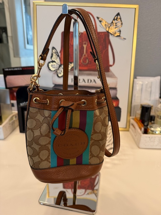 Coach Handbags - Coach Signature Rainbow Stripe
Bucket Bag | Jacquard Canvas & Leather